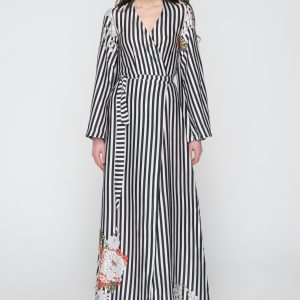 Woman in black & white maxi dress