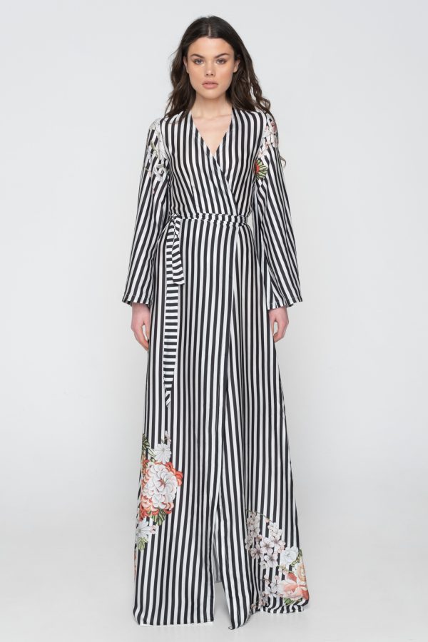 Woman in black & white maxi dress