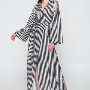 Woman in black & white maxi dress