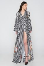 Woman in black & white maxi dress