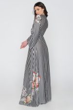 Woman in black & white maxi dress