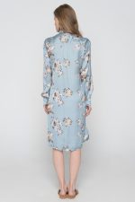 Woman in midi floral dress