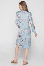 Woman in midi floral dress