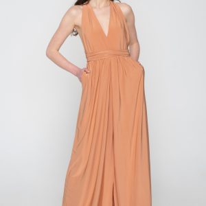 Woman in nude maxi dress