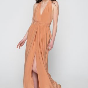 Woman in nude maxi dress