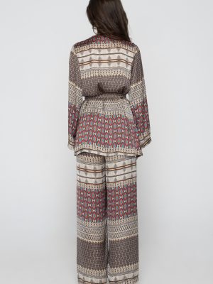 Woman in silk set top & pants