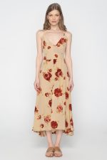 Woman is midi floral dress