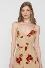 Woman is midi floral dress