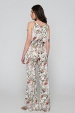 Woman in summer floral jumpsuit