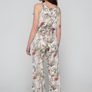 Woman in summer floral jumpsuit