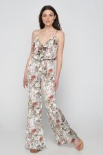 Woman in summer floral jumpsuit