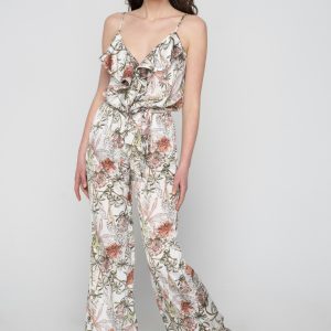 Woman in summer floral jumpsuit