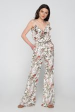 Woman in summer floral jumpsuit