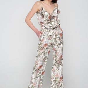 Woman in summer floral jumpsuit