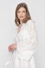 Woman in white mini dress