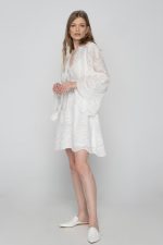 Woman in white mini dress