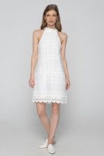 Woman in white mini dress