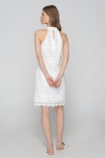 Woman in white mini dress