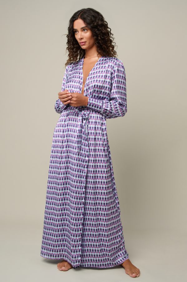 Woman in maxi patterned summer dress