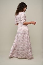 Woman in silk patterned dress