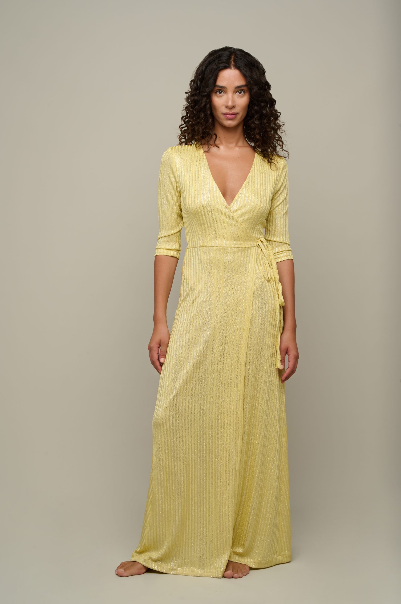 Woman in yellow summer dress