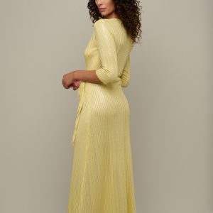 Woman in yellow summer dress