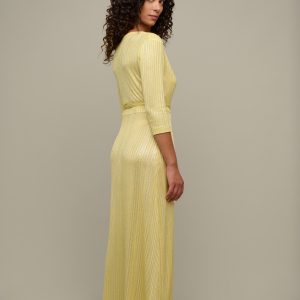 Woman in yellow summer dress