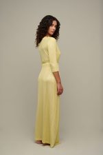 Woman in yellow summer dress