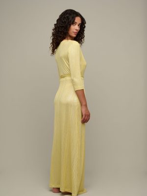 Woman in yellow summer dress