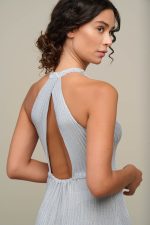 Woman in light blue summer dress