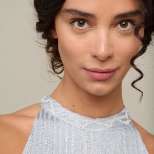 Woman in light blue summer dress