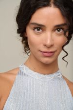 Woman in light blue summer dress