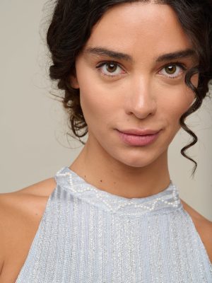 Woman in light blue summer dress