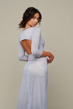 Woman in light blue summer dress