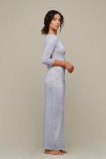 Woman in light blue summer dress