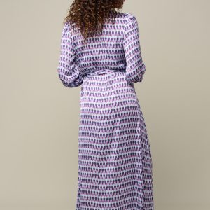 Woman in maxi patterned summer dress