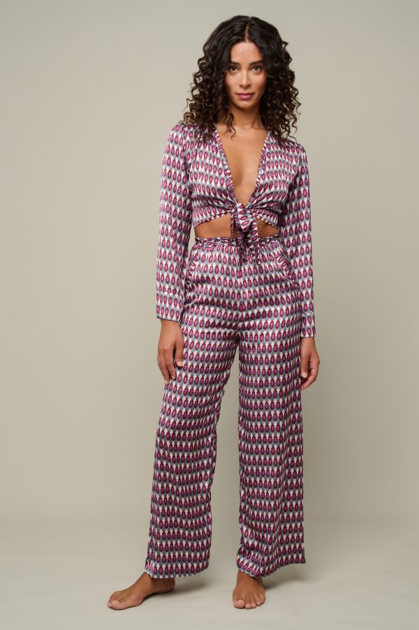 Woman in patterned set of pants and top