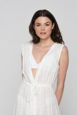 Woman wearing linen beachwear dress