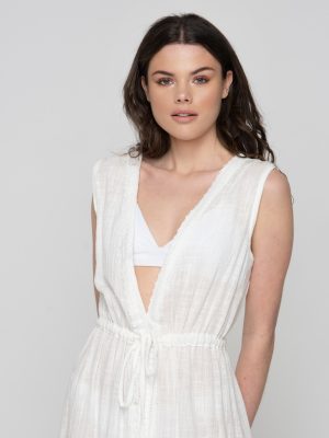 Woman wearing linen beachwear dress