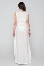 Woman wearing linen beachwear dress