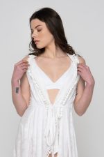 Woman wearing white beachwear dress