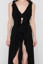 Woman wearing black beachwear kimono