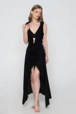 Woman wearing black beachwear kimono