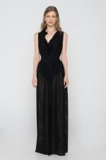 Woman wearing maxi black beachwear dress