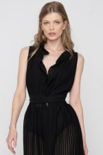 Woman wearing maxi black beachwear dress