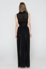 Woman wearing maxi black beachwear dress