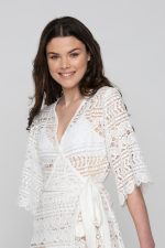 Woman wearing white summer dress