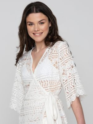 Woman wearing white summer dress