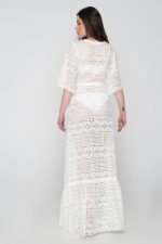 Woman wearing white summer dress