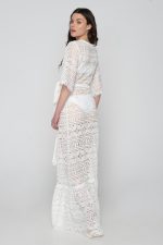 Woman wearing white summer dress